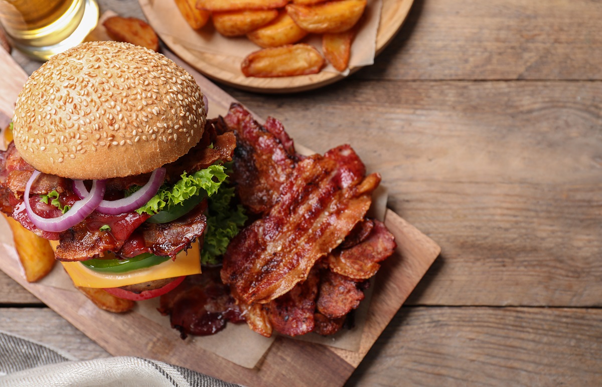 Close-up of a burger on a wooden board. Best burgers in Sydney list